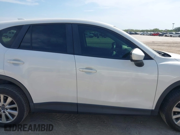2013 Mazda CX-5 Sport z VIN JM3KE2BE5D0135213, wystawiony jako IAAI lot #42270730 z przebiegiem 140 917 mil mil oraz . Historia ofert i sprzedaży dostępna na DreamBid. Obrazek 13.