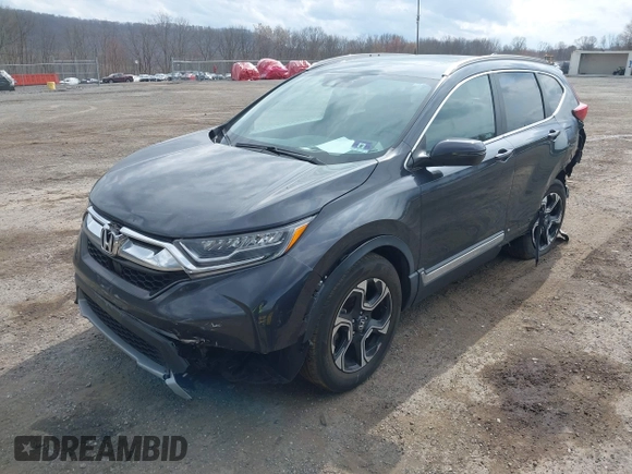 2019 Honda CR-V Touring with VIN 2HKRW2H9XKH636354, listed as a IAAI auction lot 41902615 with 66,781 mi miles and . Bid and sale history available at DreamBid. Image 17.