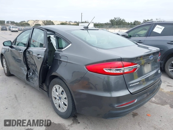 2019 Ford Fusion S with VIN 3FA6P0G79KR215541, listed as a IAAI auction lot 41626638 with 73,751 mi miles and . Bid and sale history available at DreamBid. Image 3.
