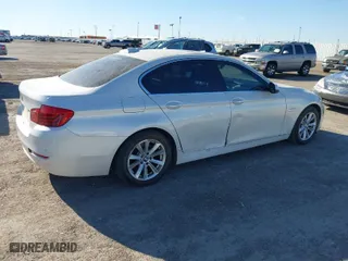 2014 BMW 5 Series 528i with VIN WBA5A5C57ED504582, listed as a IAAI auction lot 41699668 with 113,792 mi miles. Bid and sale history available at carsss.com. Image 6.