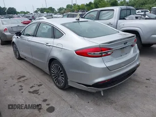 2017 Ford Fusion Hybrid Titanium с VIN 3FA6P0RU5HR181755, выставлен на аукционе IAAI как лот 42704832 с пробегом 152 688 миль миль и . История ставок и продаж доступна на DreamBid. Изображение 3.