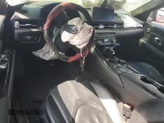 2021 Toyota Supra 3.0 с VIN WZ1DB0C03MW038964, выставлен на аукционе Copart как лот 61932835 с пробегом 24 556 миль миль и Списание • Salvage title. История ставок и продаж доступна на DreamBid. Изображение 8.