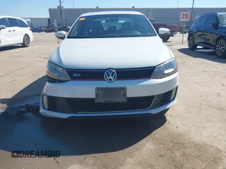 2014 Volkswagen Jetta GLI Edition 30 z VIN 3VW4S7AJ3EM278162, wystawiony jako IAAI lot #41649711 z przebiegiem 136 402 mil mil oraz . Historia ofert i sprzedaży dostępna na DreamBid. Obrazek 12.