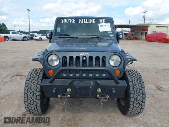 2008 Jeep Wrangler Unlimited Sahara with VIN 1J4GA591X8L520621, listed as a IAAI auction lot 42525613 with 184,239 mi miles and . Bid and sale history available at DreamBid. Image 12.