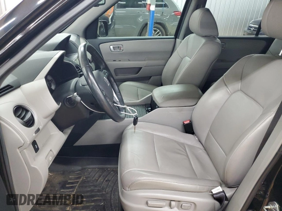 2014 Honda Pilot EX-L with VIN 5FNYF4H75EB011062, listed as a Copart auction lot 57830935 with 128,847 mi miles and Salvage title. Bid and sale history available at DreamBid. Image 7.