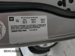 2006 Cadillac DTS 1SD z VIN 1G6KD57Y26U115094, wystawiony jako Copart lot #53534355 z przebiegiem 126 631 mil mil oraz Szkoda całkowita • Salvage title. Historia ofert i sprzedaży dostępna na DreamBid. Obrazek 12.