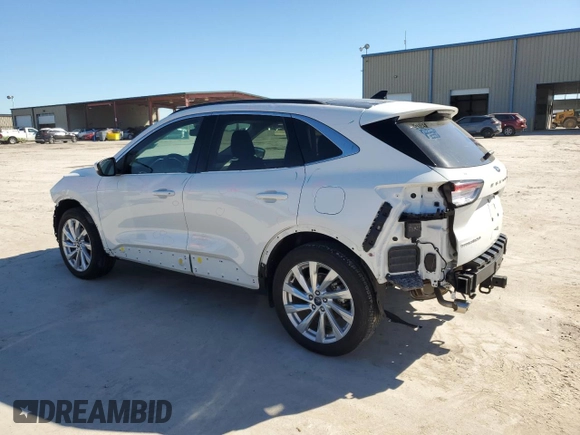 2021 Ford Escape Titanium Hybrid with VIN 1FMCU9DZ9MUA02709, listed as a Copart auction lot 56355255 with 30,571 mi miles and Salvage title. Bid and sale history available at DreamBid. Image 2.