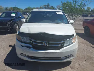 2015 Honda Odyssey Touring Elite with VIN 5FNRL5H96FB090702, listed as a IAAI auction lot 41825889 with 118,157 mi miles and . Bid and sale history available at DreamBid. Image 13.