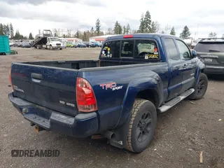 2006 Toyota Tacoma with VIN 5TEUU42N06Z165755, listed as a IAAI auction lot 41619786 with 168,910 mi miles. Bid and sale history available at carsss.com. Image 4.