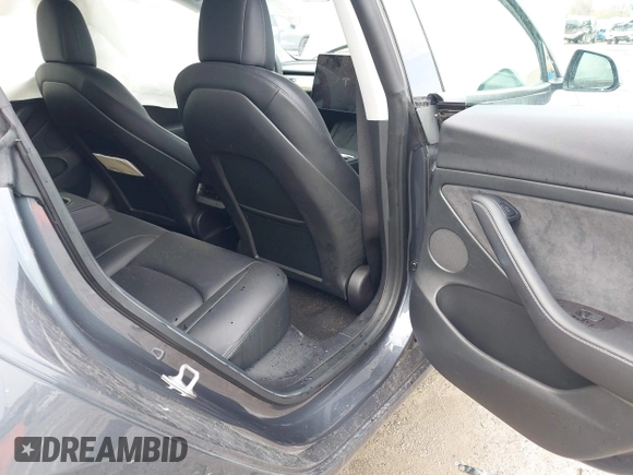 2022 Tesla Model 3 Long Range with VIN 5YJ3E1EB8NF201023, listed as a IAAI auction lot 41942943 with 30,635 mi miles and . Bid and sale history available at DreamBid. Image 8.