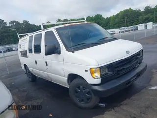 1999 Ford Econoline Cargo z VIN 1FTRE14W0XHC27388, wystawiony jako IAAI lot #42398321 z przebiegiem 292 052 mil mil oraz . Historia ofert i sprzedaży dostępna na DreamBid. Obrazek 1.