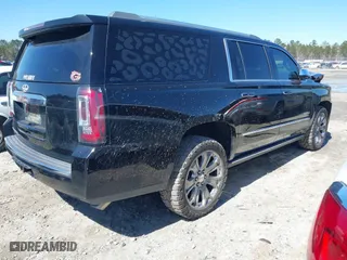 2016 GMC Yukon XL Denali with VIN 1GKS1HKJ5GR435925, listed as a IAAI auction lot 41727259 with 137,098 mi miles. Bid and sale history available at carsss.com. Image 4.