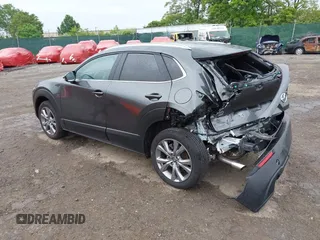 2023 Mazda CX-30 S Preferred z VIN 3MVDMBCM5PM576771, wystawiony jako IAAI lot #42244842 z przebiegiem 14 814 mil mil oraz . Historia ofert i sprzedaży dostępna na DreamBid. Obrazek 3.