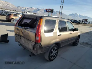 2002 Honda CR-V LX with VIN JHLRD68532C014509, listed as a Copart auction lot 86043944 with 202,988 mi miles and Salvage Title. Bid and sale history available at DreamBid. Image 3.