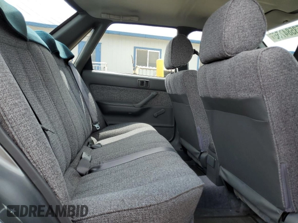 1990 Toyota Camry z VIN JT2VV21E2L0114723, wystawiony jako Copart lot #53584755 z przebiegiem 58 986 mil mil oraz Czysty tytuł • Clean title. Historia ofert i sprzedaży dostępna na DreamBid. Obrazek 10.