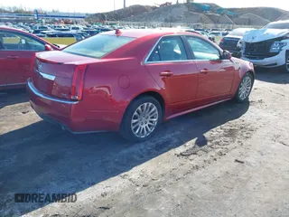 2011 Cadillac CTS Premium with VIN 1G6DS5ED7B0133154, listed as a IAAI auction lot 41822033 with 121,862 mi miles. Bid and sale history available at carsss.com. Image 4.