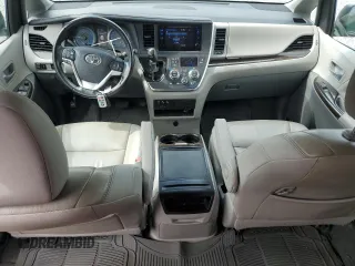 2016 Toyota Sienna XLE with VIN 5TDYK3DC8GS715148, listed as a Copart auction lot 57834045 with 128,769 mi miles and Salvage title. Bid and sale history available at DreamBid. Image 8.