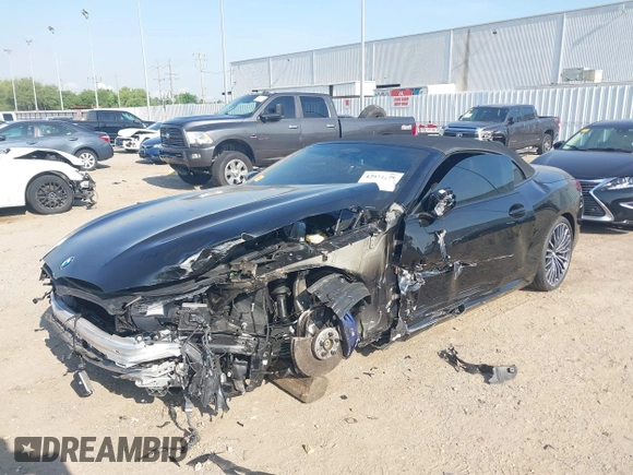 2022 BMW 8 Series with VIN WBAFY4C04NCJ78602, listed as a IAAI auction lot 42034279 with 11,757 mi miles and . Bid and sale history available at DreamBid. Image 2.
