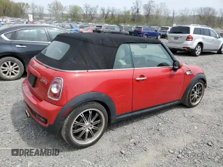 2013 MINI Convertible S с VIN WMWZP3C59DT706087, выставлен на аукционе Copart как лот 54504375 с пробегом 100 550 миль миль и Списание • Salvage title. История ставок и продаж доступна на DreamBid. Изображение 3.