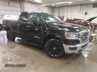 2020 Ram 1500 Laramie with VIN 1C6SRFDTXLN307213, listed as a IAAI auction lot 41915081 with 77,397 mi miles and . Bid and sale history available at DreamBid. Image 1.