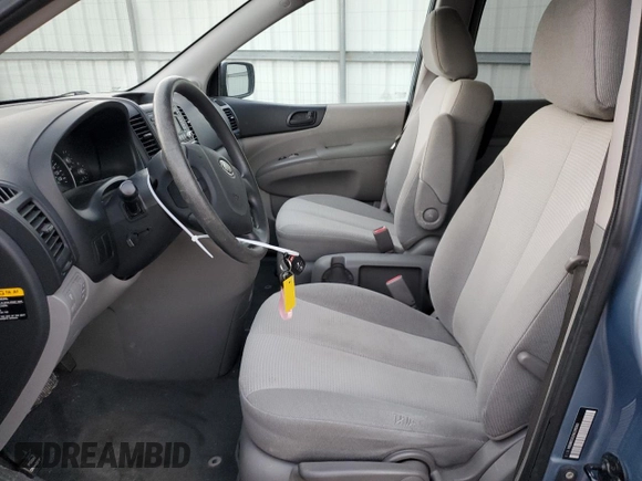 2009 Kia Sedona with VIN KNDMB133296298360, listed as a Copart auction lot 84621084 with 65,259 mi miles and Salvage Title. Bid and sale history available at carsss.com. Image 7.