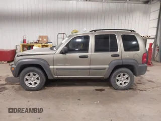 2003 Jeep Liberty Sport with VIN 1J4GL48K83W652993, listed as a IAAI auction lot 41086140 with 115,177 mi miles and . Bid and sale history available at DreamBid. Image 14.