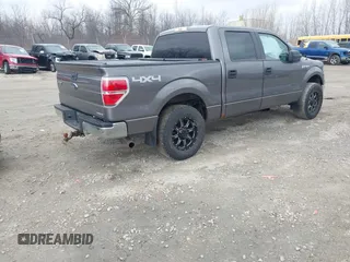 2014 Ford F-150 XL with VIN 1FTFW1EF7EFA31990, listed as a IAAI auction lot 41954531 with 158,521 mi miles. Bid and sale history available at carsss.com. Image 4.