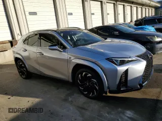 2023 Lexus UX 250h F Sport with VIN JTHB9JBHXP2067404, listed as a Copart auction lot 43605075 with 24,268 mi miles and Salvage title. Bid and sale history available at DreamBid. Image 4.