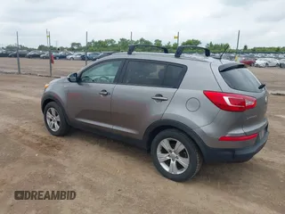2013 Kia Sportage LX with VIN KNDPBCA29D7495287, listed as a IAAI auction lot 42537122 with 221,052 mi miles and . Bid and sale history available at DreamBid. Image 3.