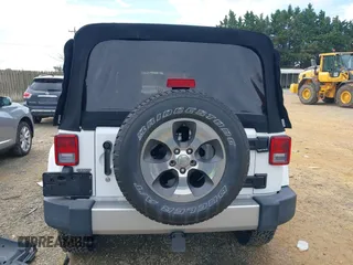 2018 Jeep Wrangler Unlimited Altitude with VIN 1C4HJWEGXJL870606, listed as a IAAI auction lot 42693031 with 92,735 mi miles and . Bid and sale history available at DreamBid. Image 17.