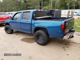 2011 GMC Canyon SLE1 with VIN 1GTH6MFE3B8119385, listed as a Copart auction lot 70492994 with 105,305 mi miles and Salvage Title. Bid and sale history available at carsss.com. Image 2.