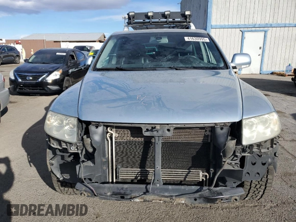2004 Volkswagen Touareg with VIN WVGEM77LX4D071560, listed as a Copart auction lot 41630995 with 168,906 mi miles and Salvage title. Bid and sale history available at DreamBid. Image 5.