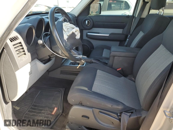2010 Dodge Nitro SXT with VIN 1D4PU5GK1AW129356, listed as a Copart auction lot 53111155 with 158,818 mi miles and Salvage Title. Bid and sale history available at DreamBid. Image 7.