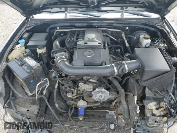 2007 Nissan Frontier SE z VIN 1N6AD09U57C437268, wystawiony jako Copart lot #49835405 z przebiegiem 145 232 mil mil oraz Szkoda całkowita • Salvage title. Historia ofert i sprzedaży dostępna na DreamBid. Obrazek 11.