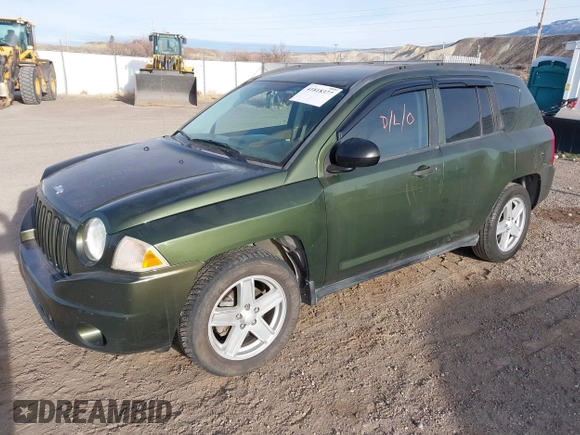 2007 Jeep Compass Sport with VIN 1J8FF47W77D199182, listed as a IAAI auction lot 41818377 with 147,125 mi miles. Bid and sale history available at carsss.com. Image 2.