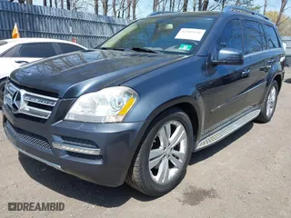 2011 Mercedes-Benz GL-Class GL 450 with VIN 4JGBF7BE9BA662497, listed as a IAAI auction lot 42102696 with 90,924 mi miles. Bid and sale history available at carsss.com. Image 2.