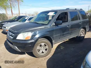 2005 Honda Pilot EX with VIN 5FNYF18455B044034, listed as a IAAI auction lot 42078473 with 265,726 mi miles. Bid and sale history available at carsss.com. Image 2.