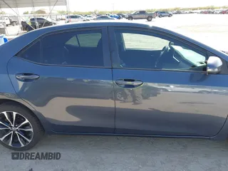 2019 Toyota Corolla L with VIN 5YFBURHE9KP910059, listed as a IAAI auction lot 41856905 with 104,096 mi miles and . Bid and sale history available at DreamBid. Image 13.