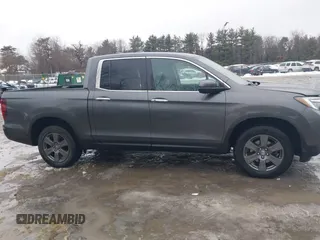 2020 Honda Ridgeline RTL-E with VIN 5FPYK3F70LB015422, listed as a IAAI auction lot 41578369 with 78,860 mi miles and . Bid and sale history available at DreamBid. Image 13.