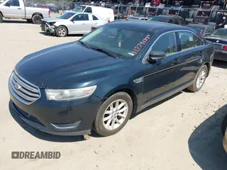 2014 Ford Taurus SE z VIN 1FAHP2D84EG162910, wystawiony jako IAAI lot #41779137 z przebiegiem Nie podano mil oraz . Historia ofert i sprzedaży dostępna na DreamBid. Obrazek 2.