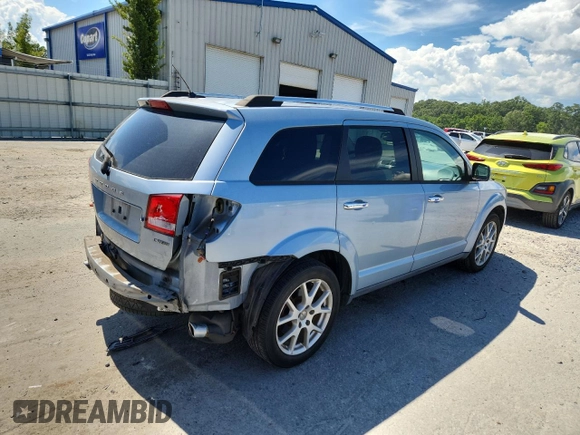 2013 Dodge Journey Crew with VIN 3C4PDCDG5DT599840, listed as a Copart auction lot 62542795 with 102,235 mi miles and Salvage title. Bid and sale history available at DreamBid. Image 3.