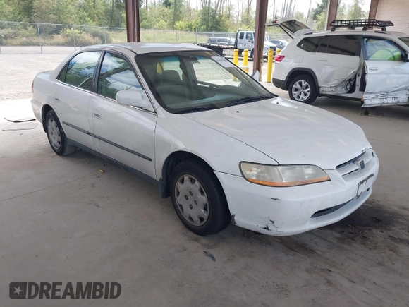 1998 Honda Accord LX with VIN 1HGCG5640WA004358, listed as a IAAI auction lot 42643808 with Not provided miles and . Bid and sale history available at DreamBid. Image 1.