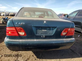 1997 Mercedes-Benz E-Class with VIN WDBJF72F7VA518538, listed as a Copart auction lot 83118824 with 167,288 mi miles and Salvage Title. Bid and sale history available at carsss.com. Image 6.