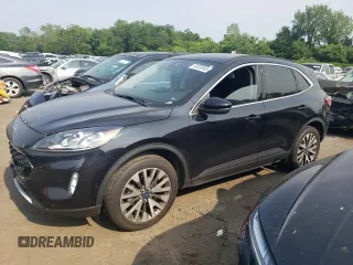 2020 Ford Escape Titanium с VIN 1FMCU9J97LUB25055, выставлен на аукционе Copart как лот 60326945 с пробегом 78 711 миль миль и Списание • Salvage title. История ставок и продаж доступна на DreamBid. Изображение 1.