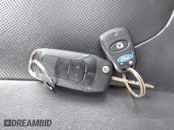 2014 Ford Fusion SE Hybrid with VIN 3FA6P0LU9ER310990, listed as a IAAI auction lot 42336303 with 197,588 mi miles and . Bid and sale history available at DreamBid. Image 11.