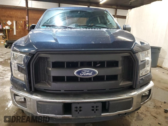 2015 Ford F-150 XLT with VIN 1FTEW1EP2FFC73690, listed as a Copart auction lot 61154355 with 145,389 mi miles and Salvage title. Bid and sale history available at DreamBid. Image 5.