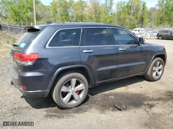 2014 Jeep Grand Cherokee Overland with VIN 1C4RJFCT1EC379867, listed as a Copart auction lot 54106375 with 217,908 mi miles and Clean Title. Bid and sale history available at carsss.com. Image 3.