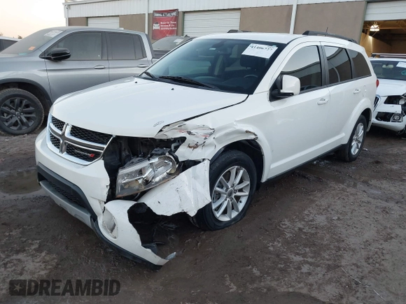 2018 Dodge Journey SXT with VIN 3C4PDCBG4JT514453, listed as a IAAI auction lot 41406727 with 121,235 mi miles. Bid and sale history available at carsss.com. Image 2.