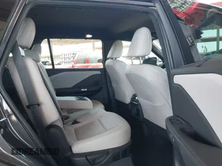 2024 Lexus TX 350 with VIN 5TDAAAB63RS002392, listed as a IAAI auction lot 42384641 with 62,857 mi miles and . Bid and sale history available at DreamBid. Image 8.
