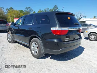 2013 Dodge Durango SXT with VIN 1C4RDJAG2DC617983, listed as a IAAI auction lot 41805992 with 210,560 mi miles and . Bid and sale history available at carsss.com. Image 3.